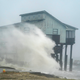 Waves take over a house as Hurricane Michael comes ashore in Alligator Point.